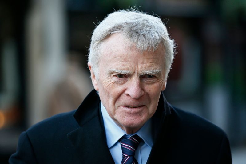 FILE PHOTO: Former FIA racing chief Max Mosley leaves the