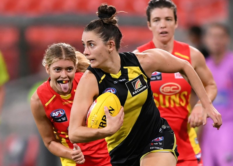 Tessa Lavey of the Tigers competes in an AFLW match