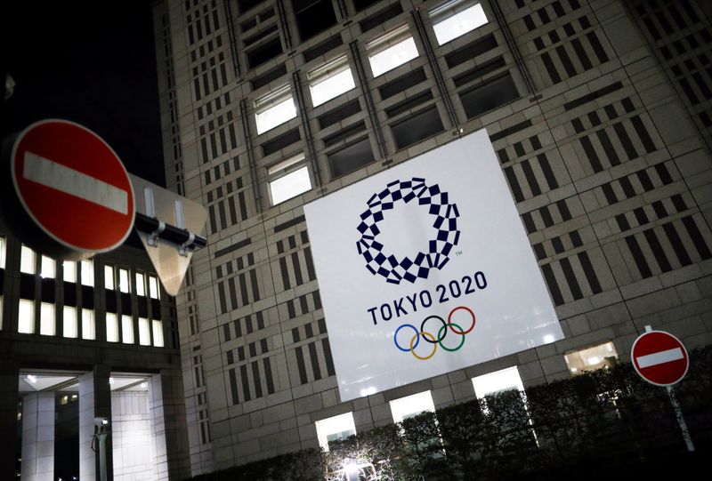 The logo of Tokyo 2020 Olympic Games is seen through