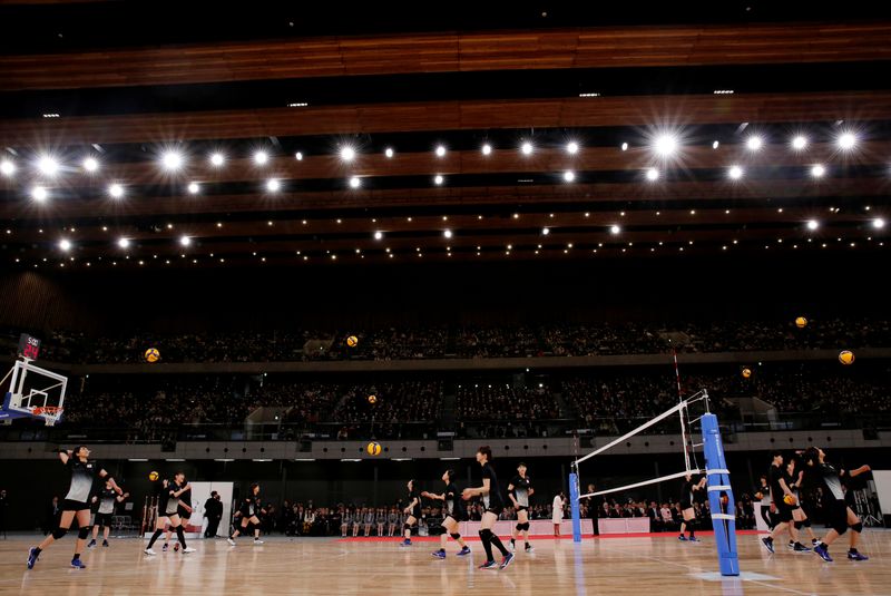 Members of Japan’s women’s national volleyball team warm up on