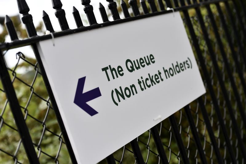 FILE PHOTO: A sign is seen for the ticket queue