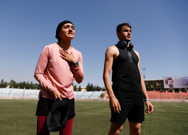 Afghan sprinters Kimia Yousofi, 25, and Sha Mahmood Noorzahi, 30,