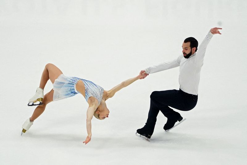 Figure skating-Cain-Gribble and LeDuc grab pairs lead at US Championships