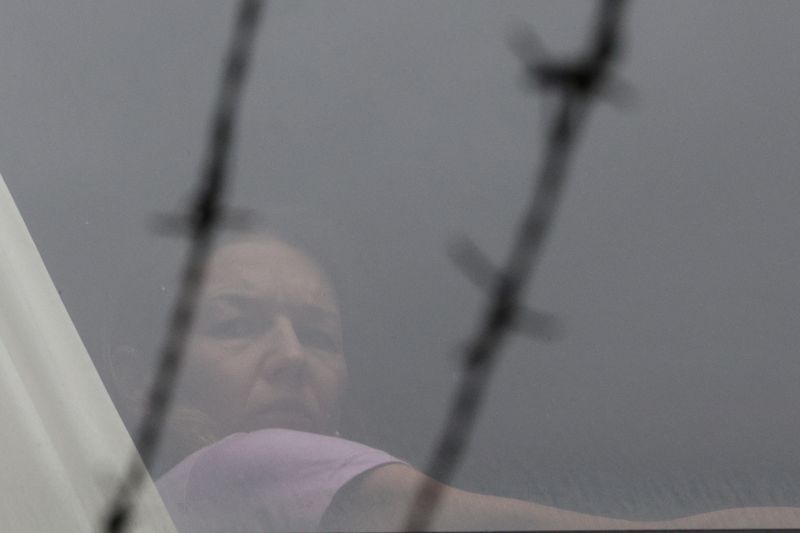 Tennis player Renata Voracova looks out a window from the