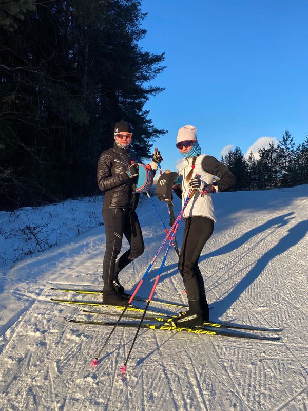 Belarusian cross-country skiers Darya Dolidovich and Sviatlana Andryiuk pose for