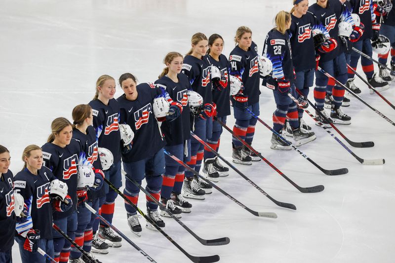 FILE PHOTO: Canada and U.S. women’s hockey national teams play