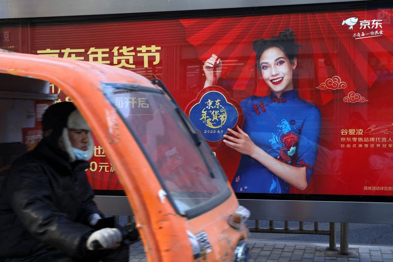Advertisement with an image of Eileen Gu at a bus