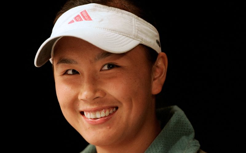 FILE PHOTO: Peng Shuai of China attends a news conference