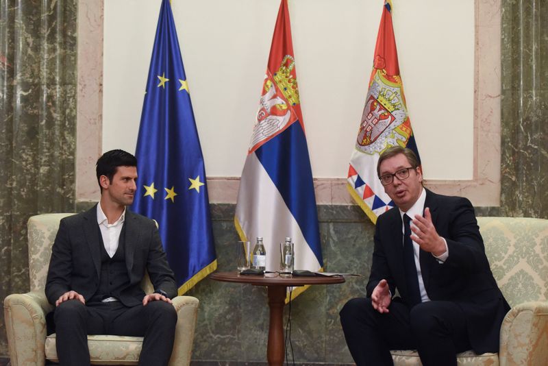 Serbian tennis player Novak Djokovic speaks with Serbia’s President Aleksandar