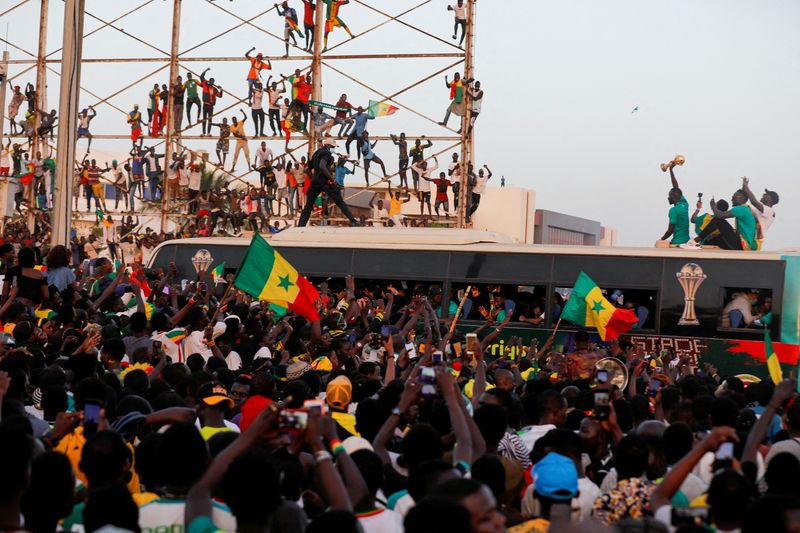 Senegal fans celebrate and welcome the Senegal National Soccer Team