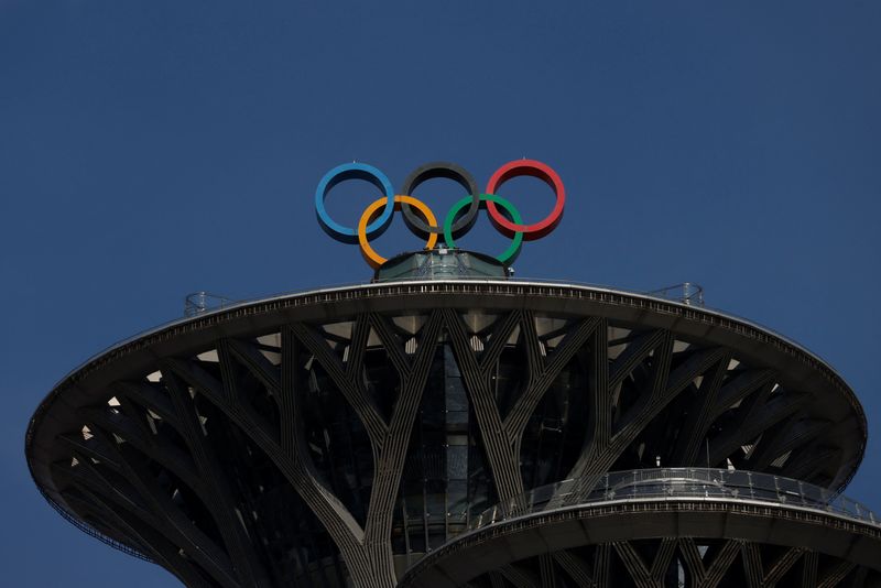 Olympic rings are pictured atop the Olympic Tower during the