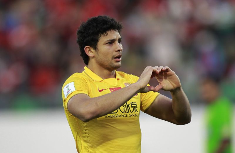 Elkeson of China’s Guangzhou Evergrande gestures as he celebrates his