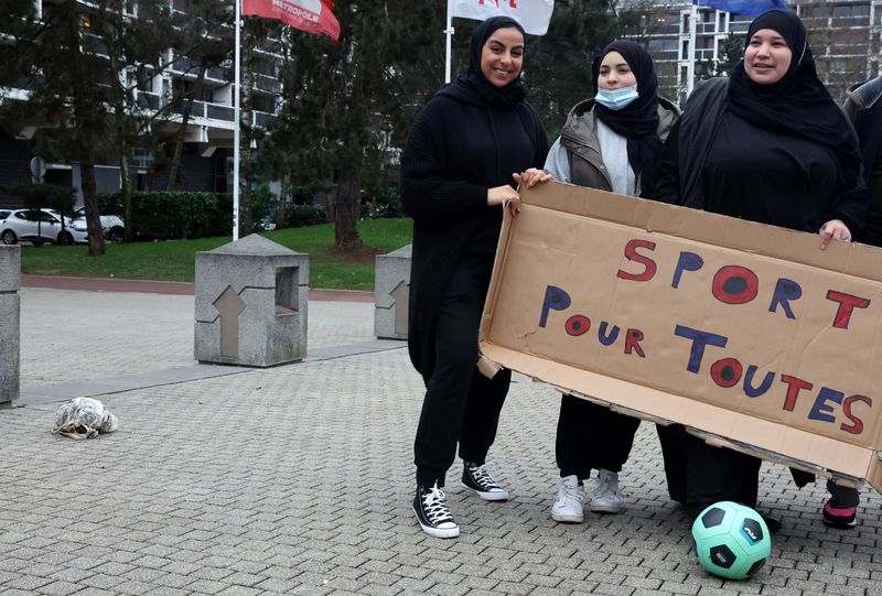 Supporters of Muslim women soccer players protest against French hijab