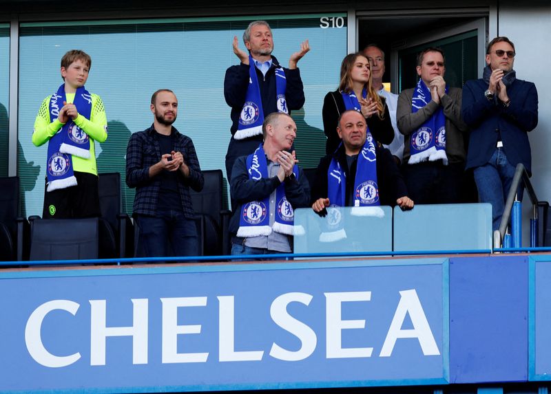 FILE PHOTO: Chelsea owner Roman Abramovich applauds fans after winning