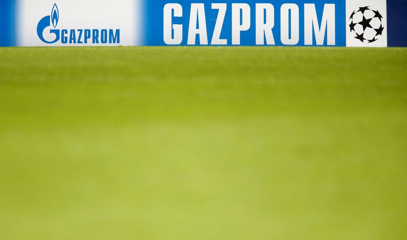 FILE PHOTO: An advertising banner for Gazprom is seen after