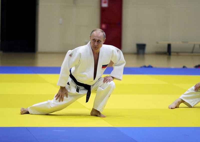FILE PHOTO: Russian President Vladimir Putin attends a judo training