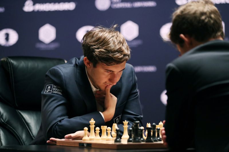 Karjakin of Russia ponders his next move against current World