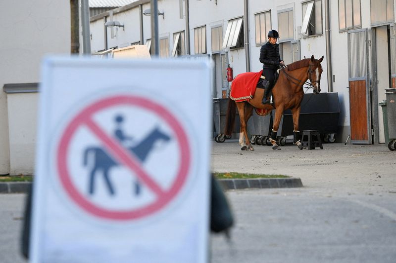 FILE PHOTO: Hungarian modern pentathletes protest plans to axe horse