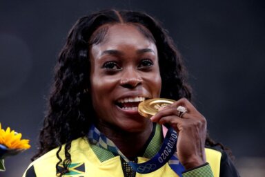 FILE PHOTO: Athletics – Women’s 100m – Medal Ceremony