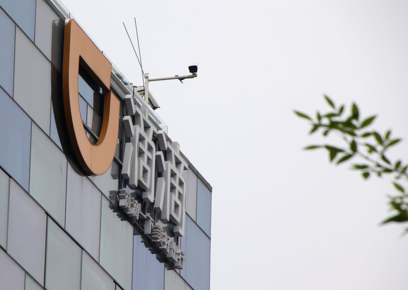 Logo of Didi Chuxing is seen at its headquarters building