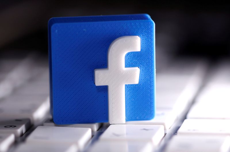 FILE PHOTO: A 3D-printed Facebook logo is seen placed on