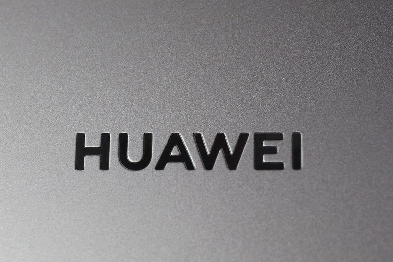 A Huawei logo is seen on a device at a