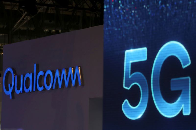 FILE PHOTO: Qualcomm and 5G logos are seen at the