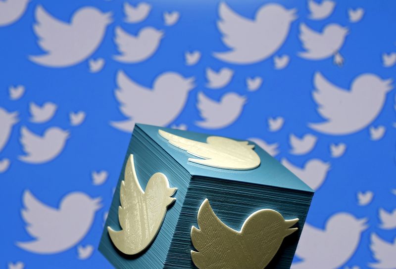 A 3D-printed logo for Twitter is seen in this picture