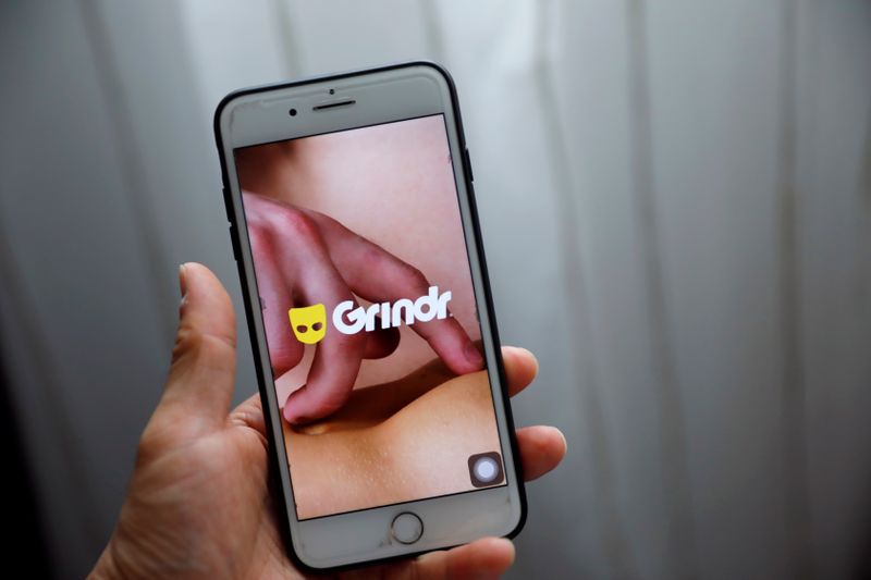Grindr app is seen on a mobile phone in this