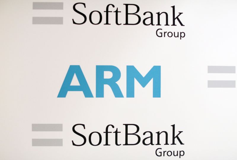 FILE PHOTO: An ARM and SoftBank Group branded board is