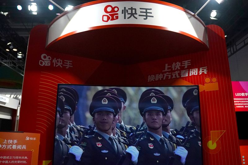 FILE PHOTO: A screen showing footage of a military parade