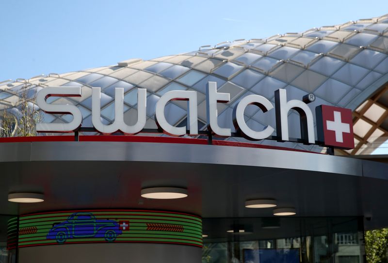 A Swatch logo is pictured in front of the newly