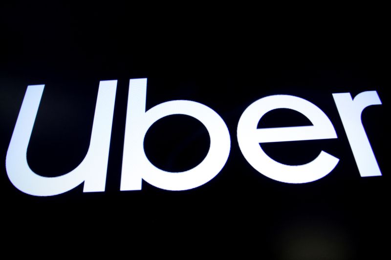 A screen displays the company logo for Uber Technologies Inc.
