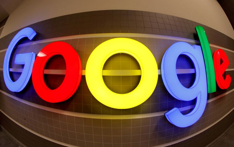 FILE PHOTO: FILE PHOTO: An illuminated Google logo is seen