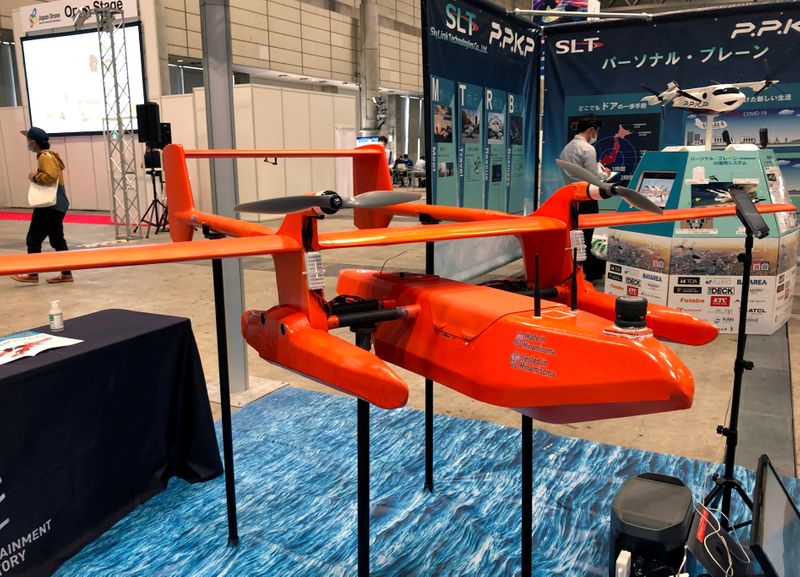 FILE PHOTO: An unmanned flying boat named ‘HAMADORI’ is displayed