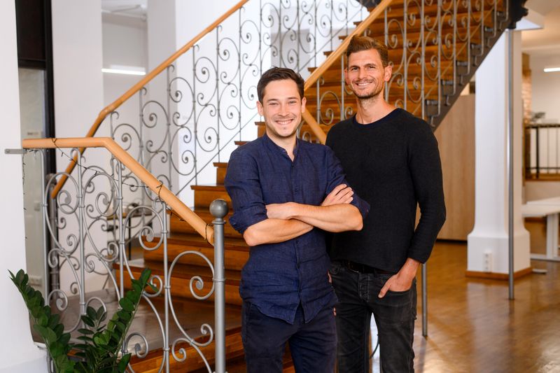 Limehome co-founders Lars Staebe (L) and Josef Vollmayr (R) pose