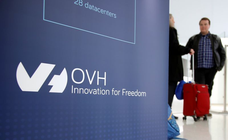 Visitors stand at the French web-hosting and server provider OVH