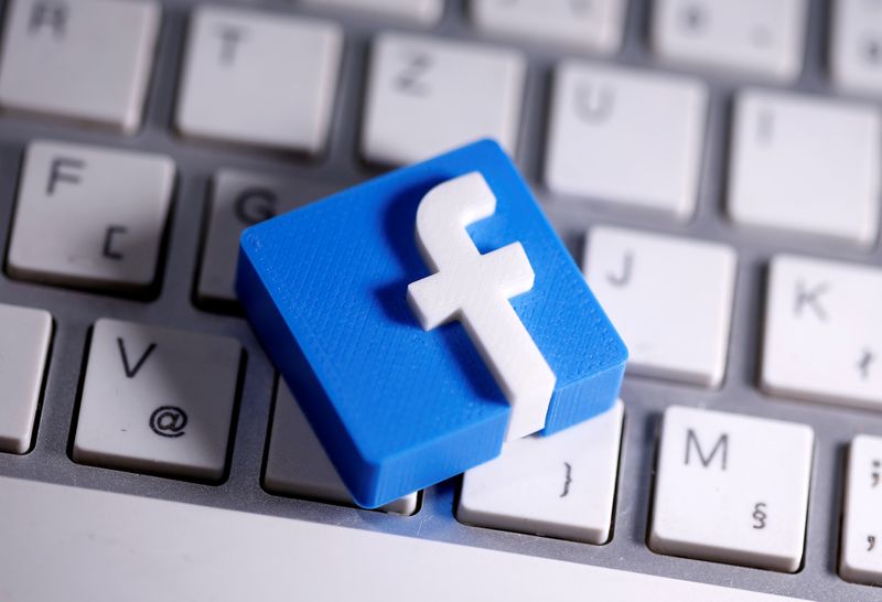 FILE PHOTO: A 3D-printed Facebook logo is seen placed on