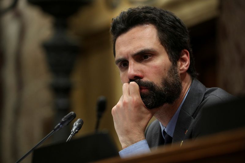 FILE PHOTO: Catalan parliament speaker Roger Torrent looks on during