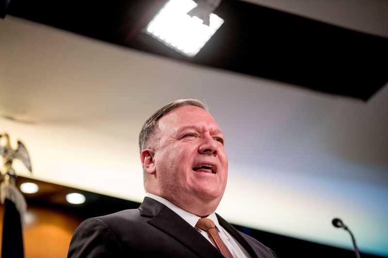 FILE PHOTO: U.S. Secretary of State Mike Pompeo holds a