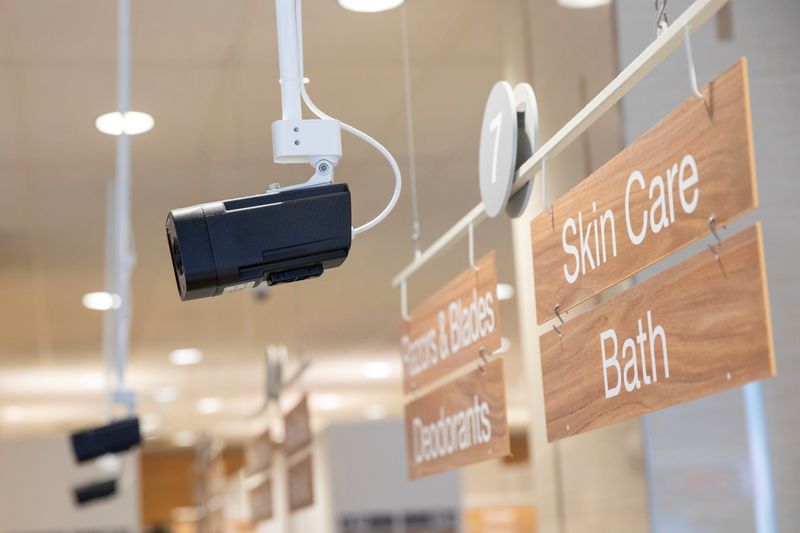 DeepCam security cameras monitor shoppers inside a Rite Aid store