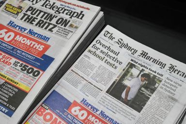 Newspapers are seen for sale at a shop in Sydney