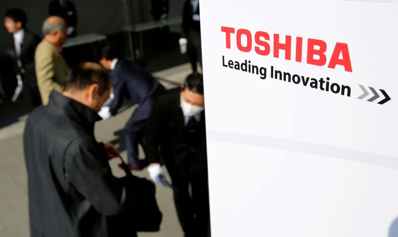 The logo of Toshiba is seen as shareholders arrive at