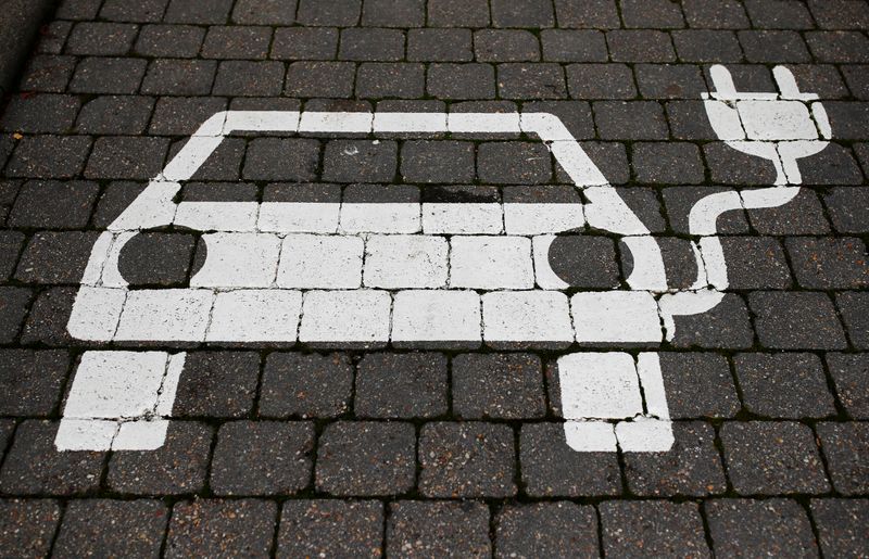 FILE PHOTO: A parking sign for electric vehicles is pictured