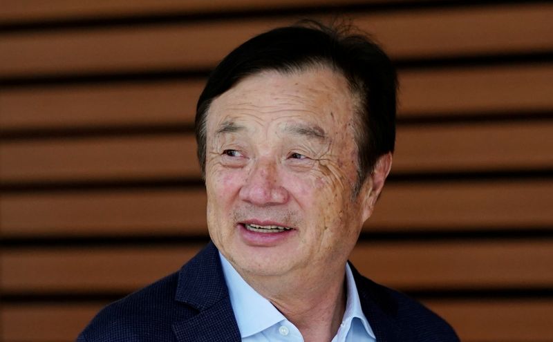 Huawei founder Ren Zhengfei attends a panel discussion at the