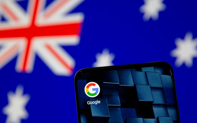 FILE PHOTO: A smartphone with a Google app icon is