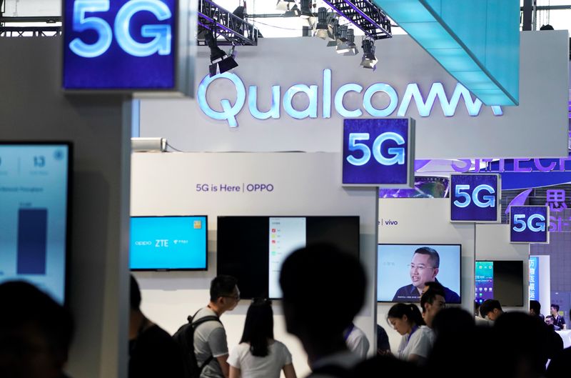 Signs of Qualcomm and 5G are pictured at Mobile World