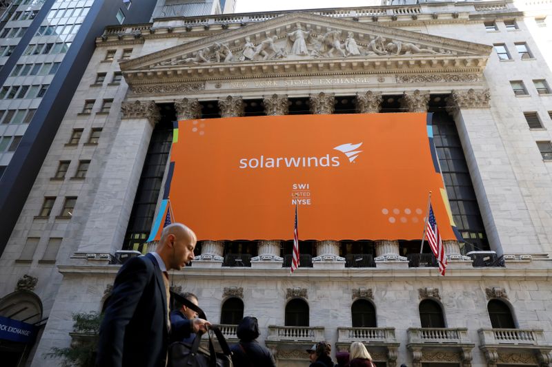 FILE PHOTO: SolarWinds Corp. banner hangs on the company’s IPO