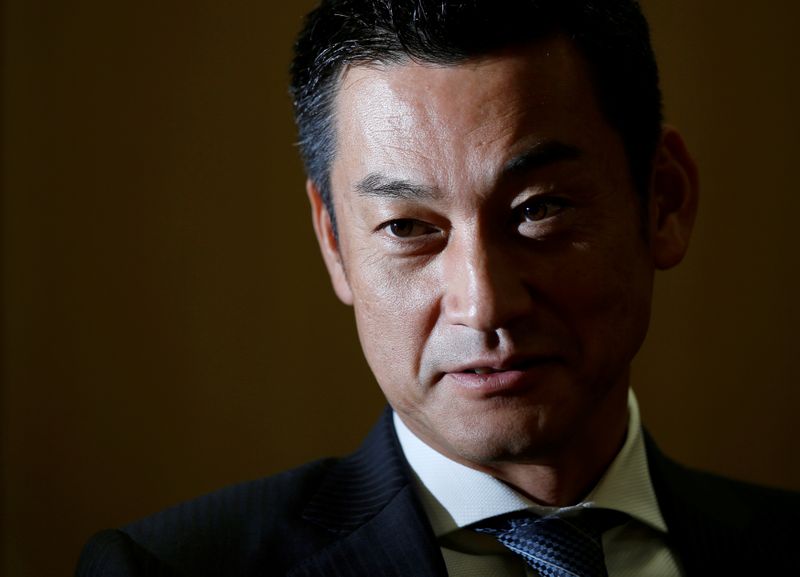 FILE PHOTO: Japan Post Bank Chief Investment Officer Katsunori Sago