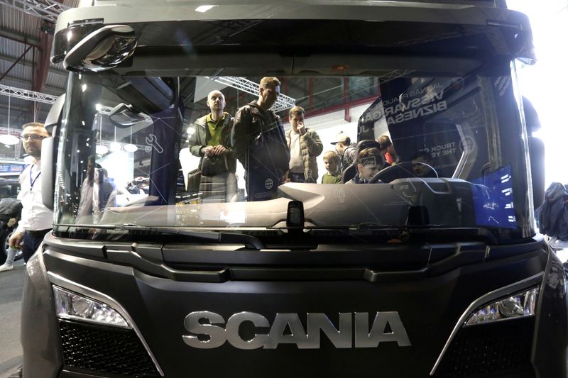 People look inside Scania truck during International Motor Show in